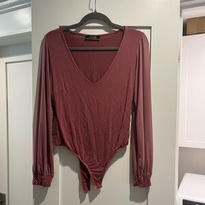 Pink long sleeve bodysuit